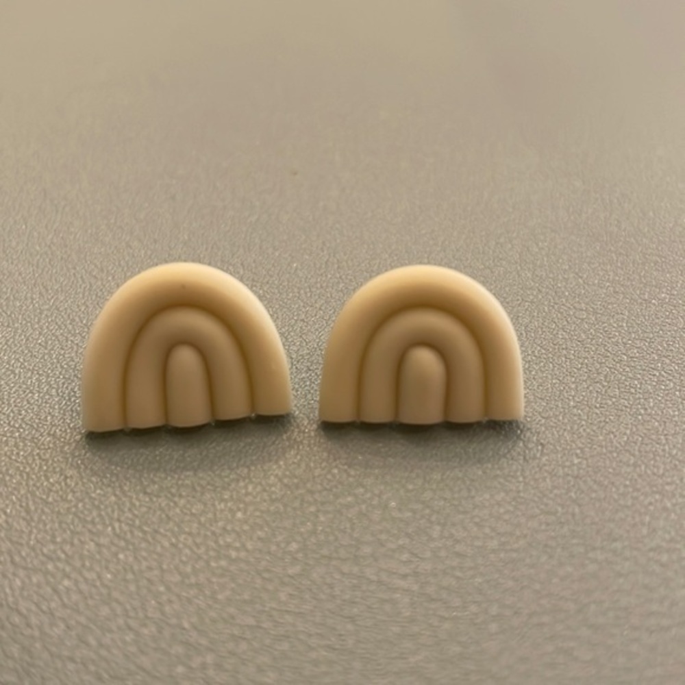 Cream rainbow shaped earrings